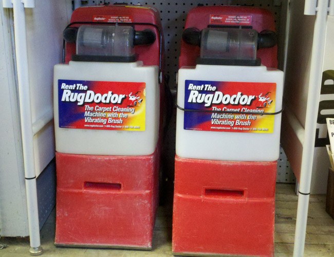 Two red Rug Doctor machines inside the store